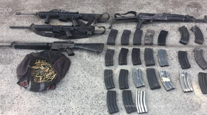 Policía Michoacán captura a 4 armados en campamento de Aguililla