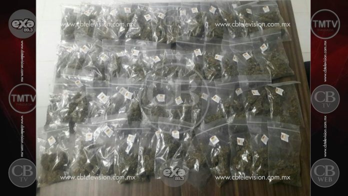 Detienen a mujer que transportaba droga en Venustiano Carranza