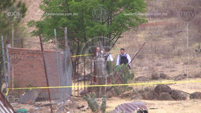 Localizan cuerpo baleado sobre un camino sinuoso