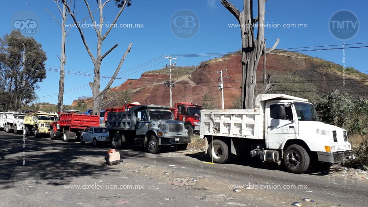Exigen choferes de camiones no al impuesto de materiales para construcción