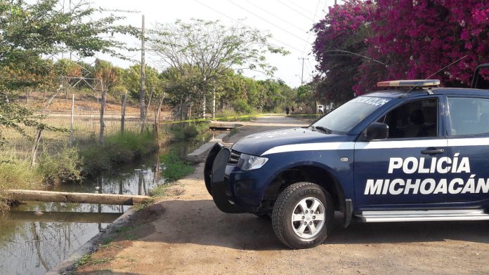 Hallan a taxista de Morelia muerto a balazos en Las Guacamayas en LC
