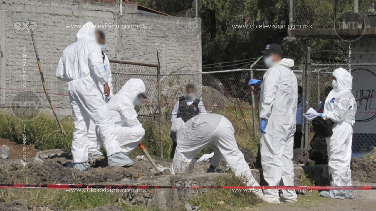 Hallan un muerto semienterrado y encobijado en colonia de Morelia