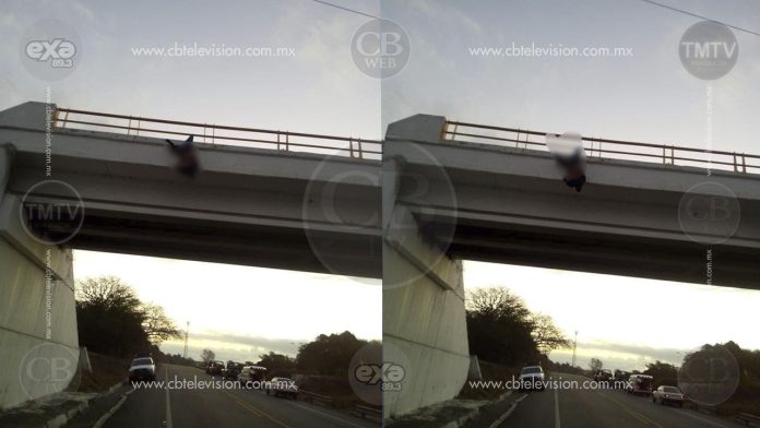Hallan cadáver colgado en un puente sobre el tramo carretero Marelia-Lázaro Cárdenas
