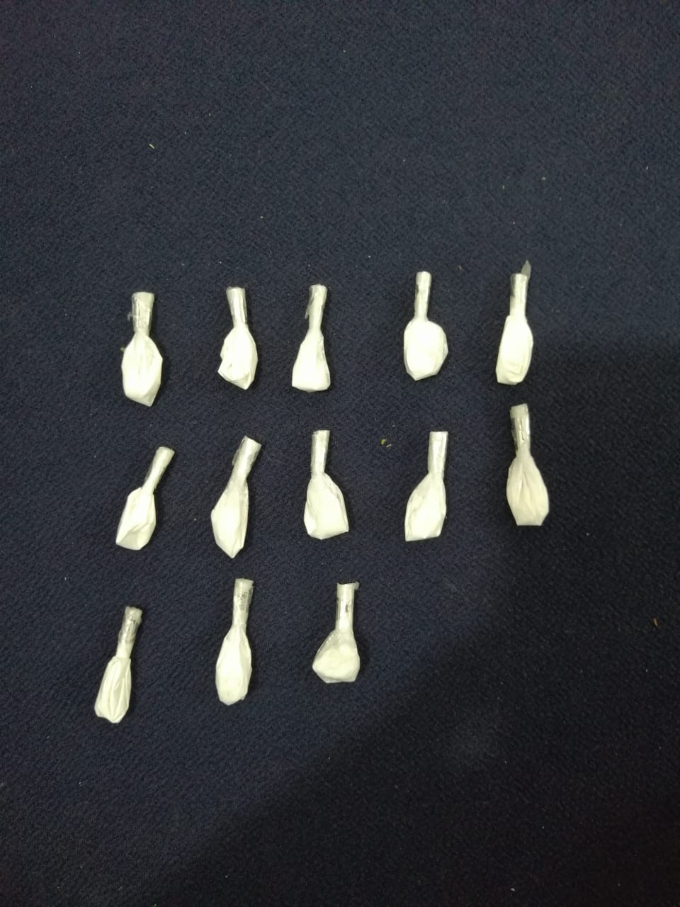 Arrestan en Uruapan a cinco hombres por posesión de droga y vehículos con reporte de robo