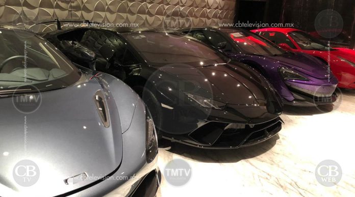 Catean casas y decomisan autos de ensueño, dinero y drogas