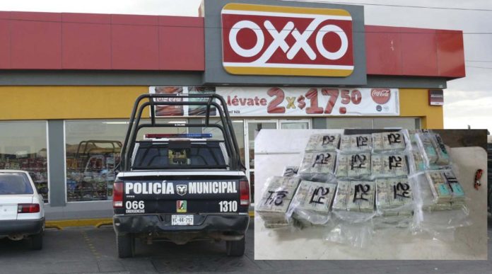 Tras cateo encuentran 1.3 millones de dólares y armas en un Oxxo