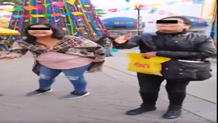 Video: Mujer intenta correr a pareja gay porque se estaban besando