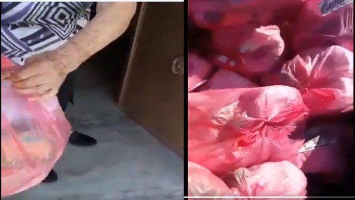 Video: Sicarios del CJNG reparten despensas como regalos de Navidad