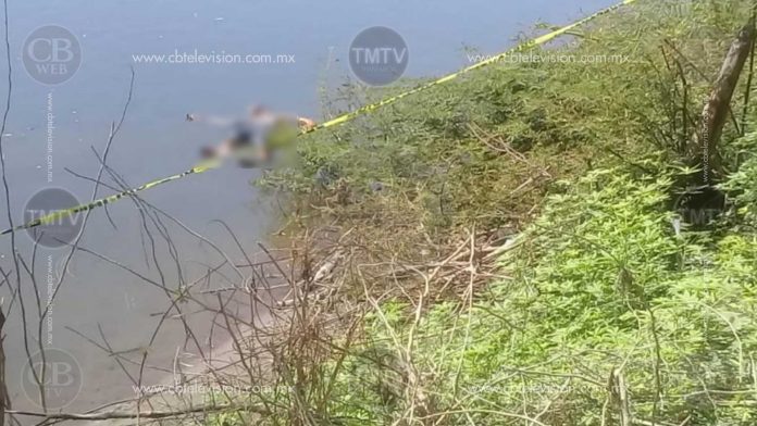 Michoacán: Localizan a un hombre muerto dentro del Río Balsas