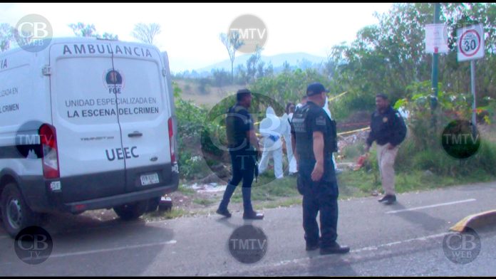 Hallan a una mujer semienterrada en Huetamo