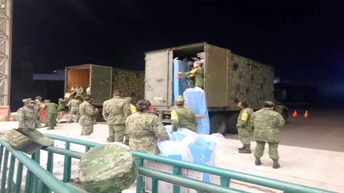 Ejército y Fuerza Aérea traslada equipo médico a Morelia
