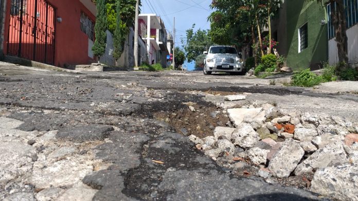 En la Opinión de...Jaime Martínez.Nuestras calles están llenas de baches