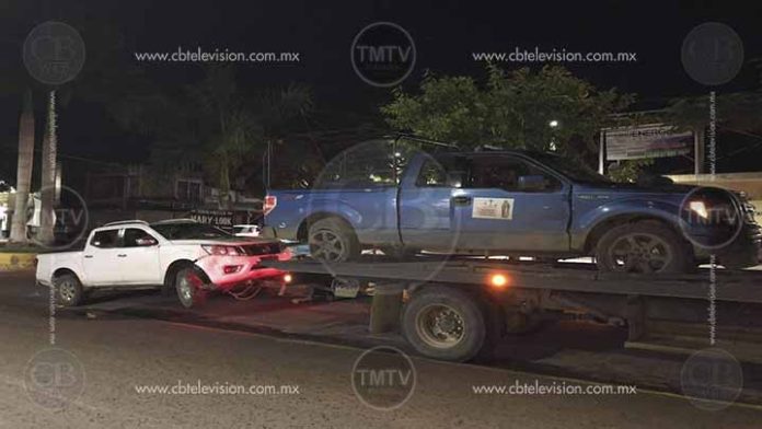 Localizan dos hombres putrefactos y camionetas en Coalcomán