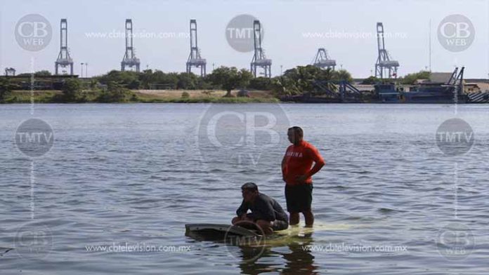 Chofer es localizado muerto en su taxi al fondo del Río Balsas