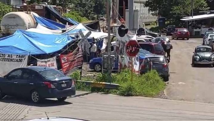 120 mil tráileres retenidos por bloqueos en Caltzontzin