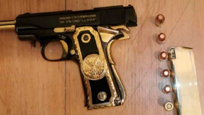 Pistola de oro