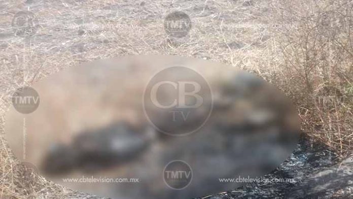 Hallan un cuerpo calcinado al norte de Morelia