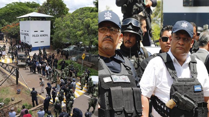 Fuerzas policiales quitan barricadas de autodefensas en Ario de Rosales