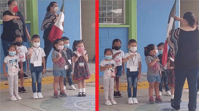 Niños se confunden y “saludan” al público durante honores a la bandera