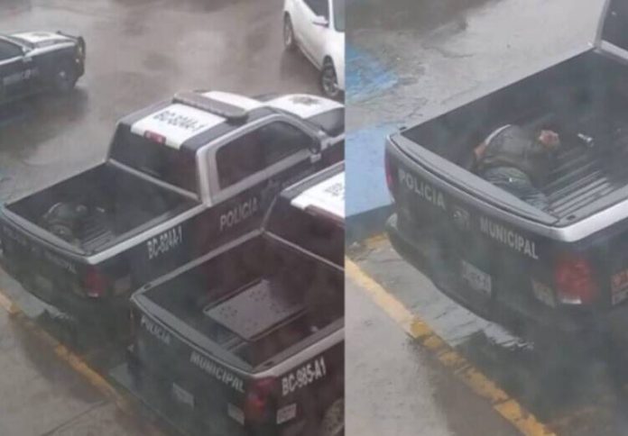 Policías de Tijuana abandonaron a un detenido sobre una patrulla y bajo la lluvia