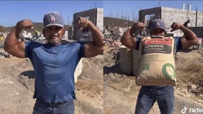 Albañil se vuelve viral por cargar los bultos de cemento con los dientes