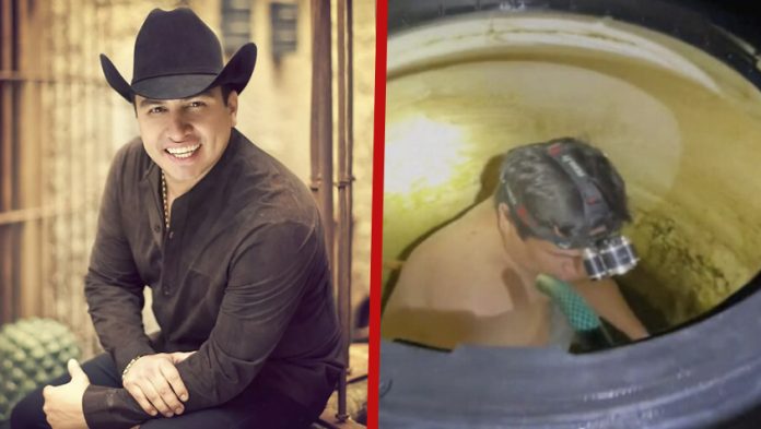 Captan a Julión Álvarez lavando su tinaco y causa sensación en redes sociales