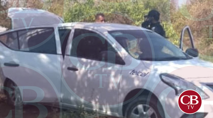 Abandonan ejecutado en el asiento de un auto en Aguililla