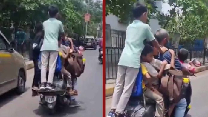 Hombre llevaba a la escuela a siete niños en su moto