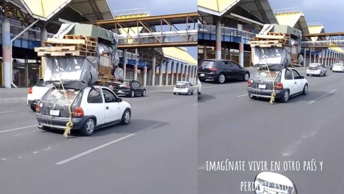 Captan auto Chevy realizando gran mudanza