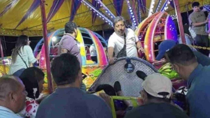 Carrito de juego mecánico se safa en feria y deja dos heridos