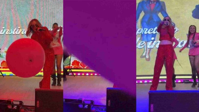 Belinda golpea y le tira su celular a un fan en pleno concierto