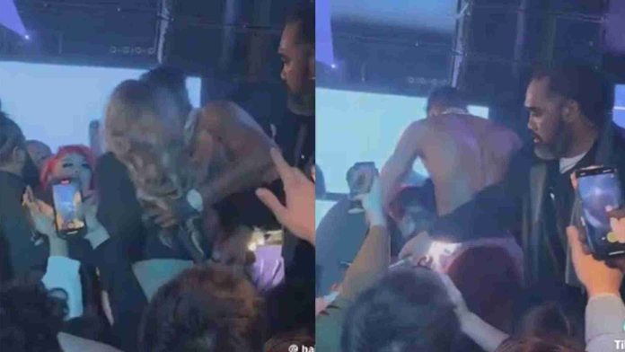 Rapero arrastra a fan en pleno concierto