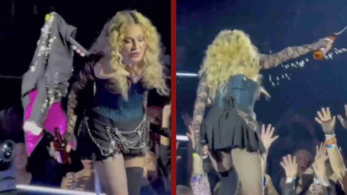 Critican a Madonna por escupir a sus fans durante concierto