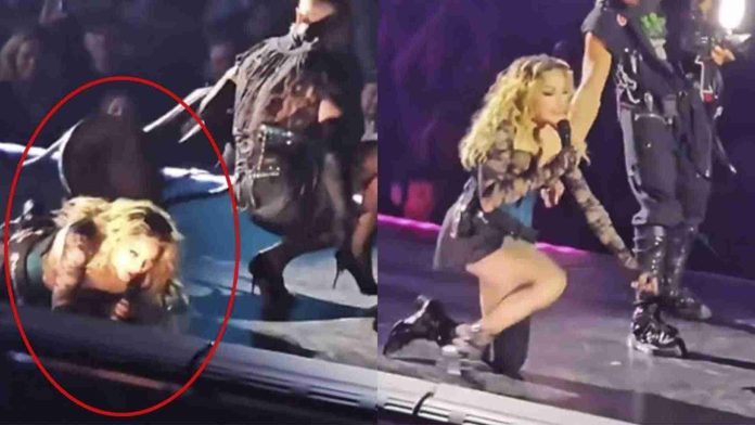Madonna sufre caída en pleno escenario