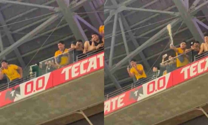#Video: Fan de 'Tigres' orina en vaso y se lo arroja a la afición de 'Rayados'