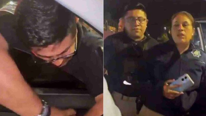 Captan a policía agrediendo a conductora en Puebla