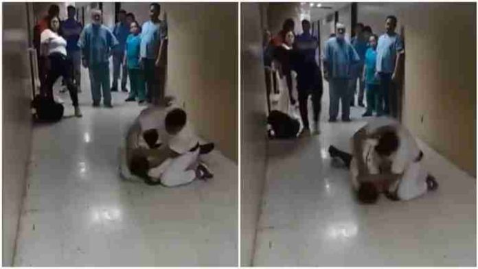 #Video: Enfermero golpea a guardia y lo amenaza con 'levantarlo'