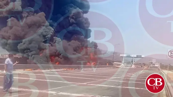 Pipa con combustible vuelca y se incendia en la México-Guadalajara
