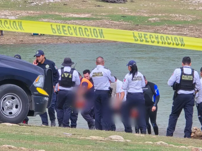 Localizan al segundo cuerpo de los jóvenes ahogados en la Presa de Cointzio